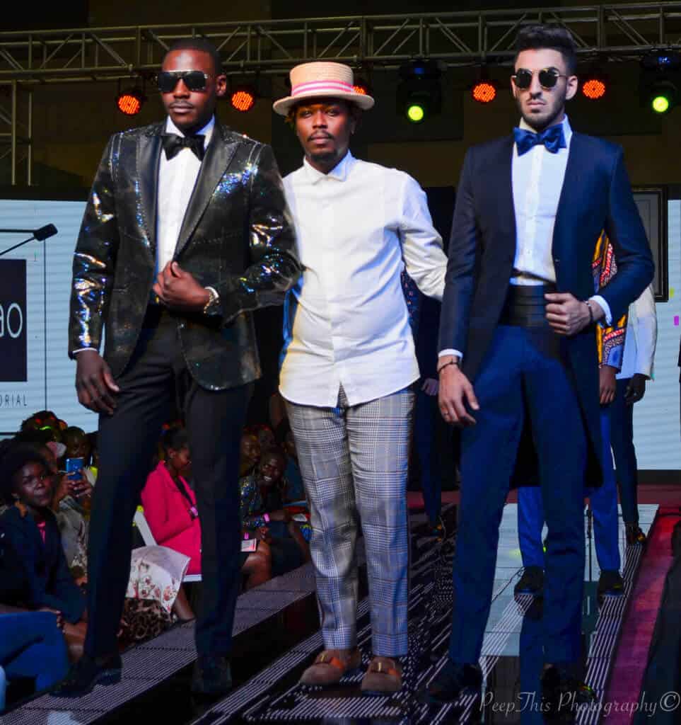 Three models showcasing SAO's mastery of the art of tailoring on the runway